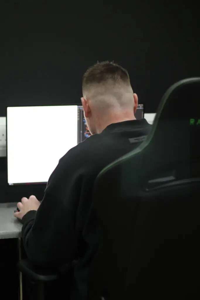 Sam developing a client website in the SJH Studio